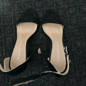 Size 6.5 black heels. Worn one time